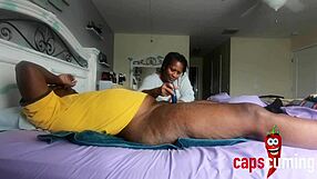 Ebony MILF shows off her large ass and natural tits