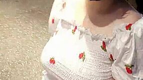 Busty babe flashes in public to thrill-seekers