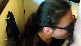Kristine Boag delivers a homemade blowjob with glasses on, sucking amateur cock passionately.
