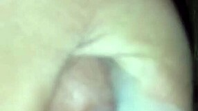 slowly stroking my throbbing cock until it erupts with cum