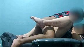 A filipina woman shares intimate moments with her partner in a homemade setting