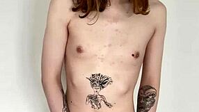 The tattooed transsexual slut jerks her cock in a solo masturbation session