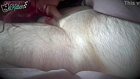 redhead in lingerie assists him on the bed