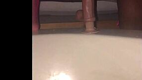 A black wife casually shows off her figure and curves