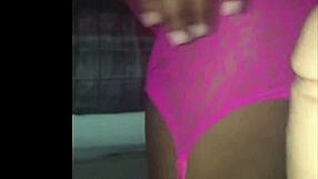 A black wife casually shows off her figure and curves