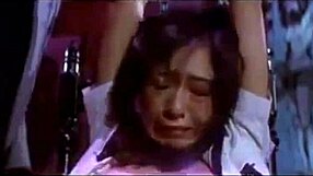 a woman quietly explores her body alone in her room