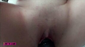 The huge black cock makes her squirt wildly in intense orgasm.