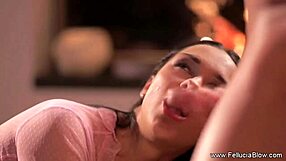 Brunette babe feels intense pleasure during fireside blowjob and handjob cumshot