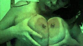 Watch her play with those big boobs on webcam!