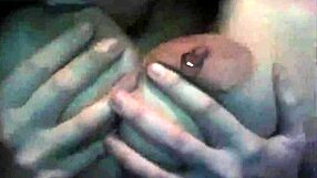 Watch her play with those big boobs on webcam!