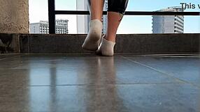 dominatrix nika dirties her white socks for a slave boy