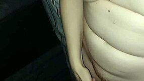 The wife experiences a double orgasm while playing with her boobs in the bedroom.