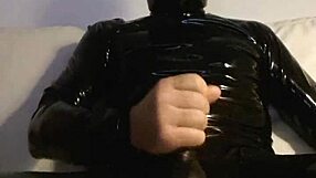 she's stroking her pussy in tight latex