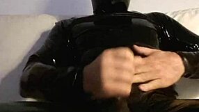 she's stroking her pussy in tight latex