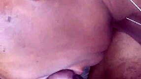Side view of ebony teen with big tits and tattoo sucking monster cock at work, leading to cumshot.