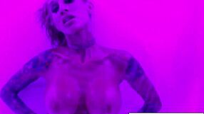 Artistic milf with tattoos masturbates wetly, teasing her curves.