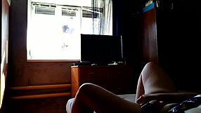 Milf masturbates with dildo for window cleaner