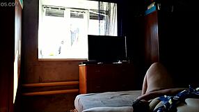 Milf masturbates with dildo for window cleaner