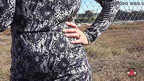 Sexy latina milf fingers outdoors in public