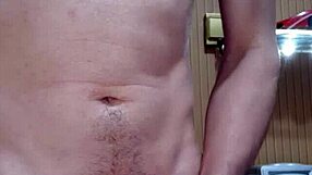 Soldier masturbating to climax with a massive cock