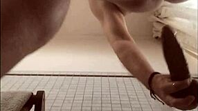 playing with a big black dildo in the room