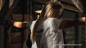 Harsh, rough strap on sex for a secured lesbian slave in a hardcore BDSM scene