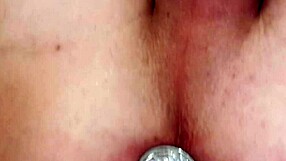 I carefully insert the butt plug for relaxation