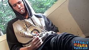 Homosexual thug smokes outdoors and jacks off!