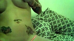 sizzling hot tattooed shemale performs on webcam with intense actions