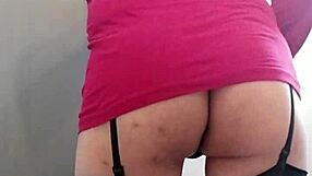 Travesti enjoying a wild ride on a thick dildo