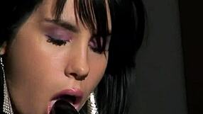 Hot brunette teen 18+ stimulates her clit and reaches anal orgasm using a black dildo.