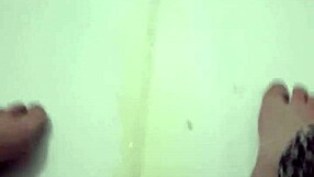 Want to see pissing in leggings in the bathtub?