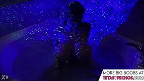 blue shows off her big tits in the bath tub