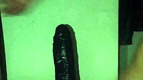 argentinian transsexual uses black dildo