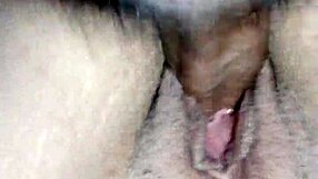 A brunette MILF enjoys her urine