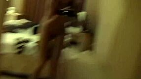 A young and a slim girl dancing provocatively in her room