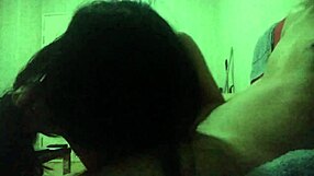 Asian teen with tattoo fucks friend on red sofa in homemade hardcore session.