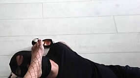 Look at her feet under fishnet stockings