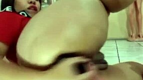 Brazilian Babe Enjoys Inserting Big Black Dildo