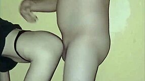 Seducing each other a couple embrace in one the intensity of homemade love