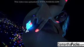 samantha saint touches her big tits and ass in black light solo