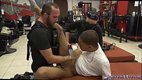 This explicit video shows a gay police officer having sex with a robbery suspect