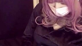 Beautiful O director ladyboy dressed in cat ear dress performs self pleasure on camera