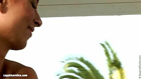 Veranda lesbians play with dildos outdoors by Sapphic Erotica