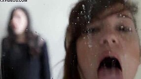 Intense spitting fetish scene with wet mouths and saliva play