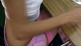 Sexy young 18+ girl in uniform acts as clothed prostitute in softcore scene