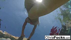 Olivia enjoys summer fun in the pool