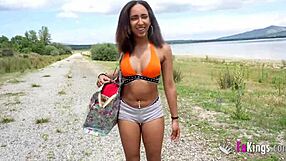 Ebony babe shows us how to get any guy next to the lake with cowgirl sex and boobs