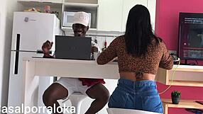 Naughty wife teases husband in kitchen while friend converses distractedly