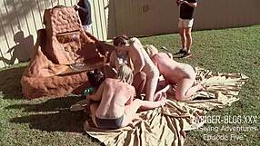 horny babes lick and fuck toys in outdoor lesbian orgy